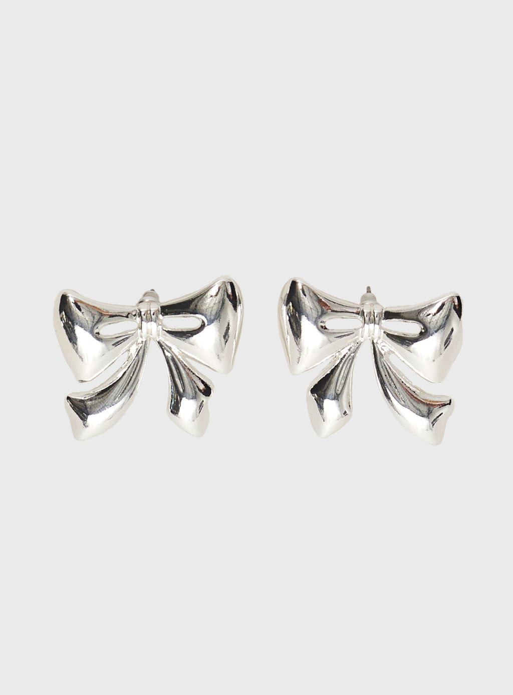 Make Believe Bow Earrings Silver