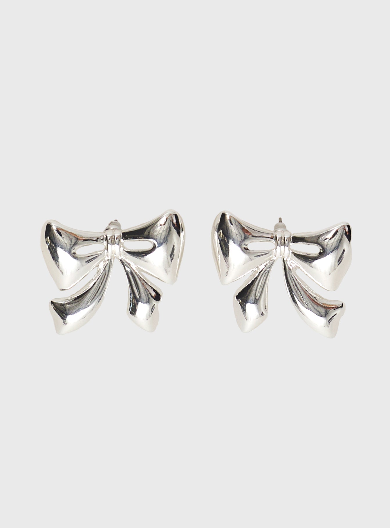 Make Believe Bow Earrings Silver